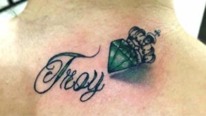 Name Tattoo With A Jewel On It